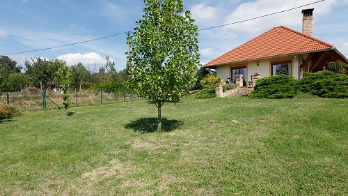 33487 It is a beautiful, traditional family house for sale in a quiet environment, with a panoramic view of the lake Balaton.