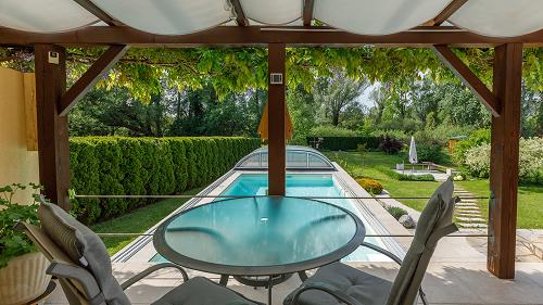 33537 It is a beautiful and tasteful, discreet family house for sale a few minutes away from the shoreline of lake Balaton.